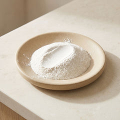 Fine white zinc oxide powder in a small dish