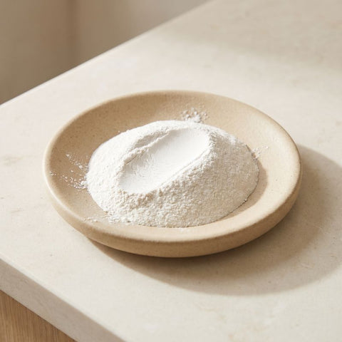 Fine white zinc oxide powder in a small dish